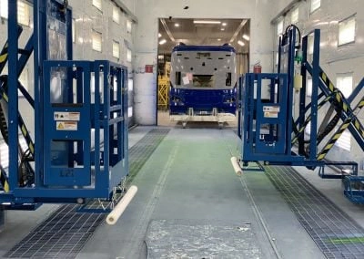 Large equipment paint booth for oversized vehicle finishing.