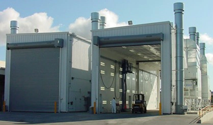 Outdoor paint booth exterior with two bays
